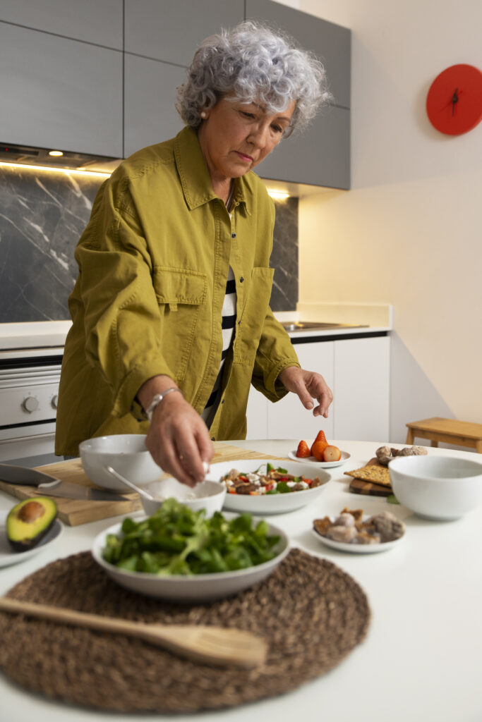Senior woman cooking healthy food